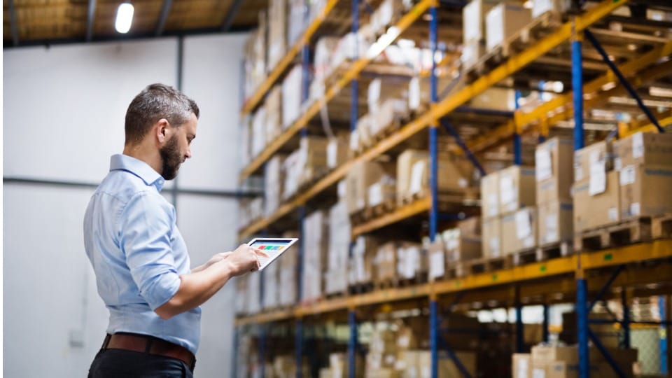 warehouse worker with a tablet