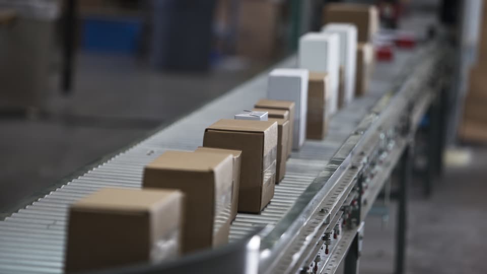 packages on a conveyor belt