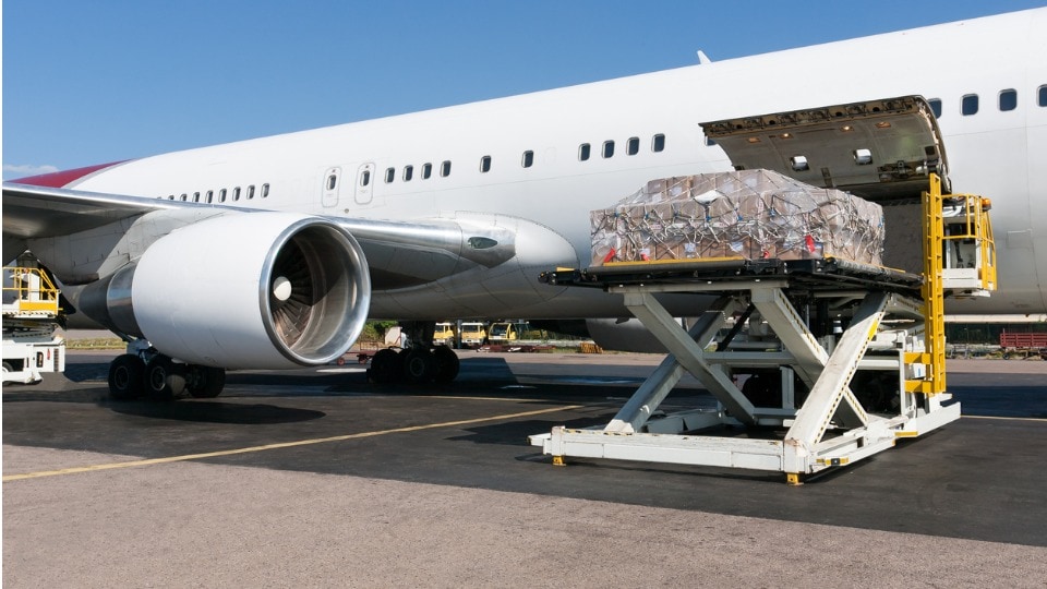 Cargo freight being loaded into an airplane