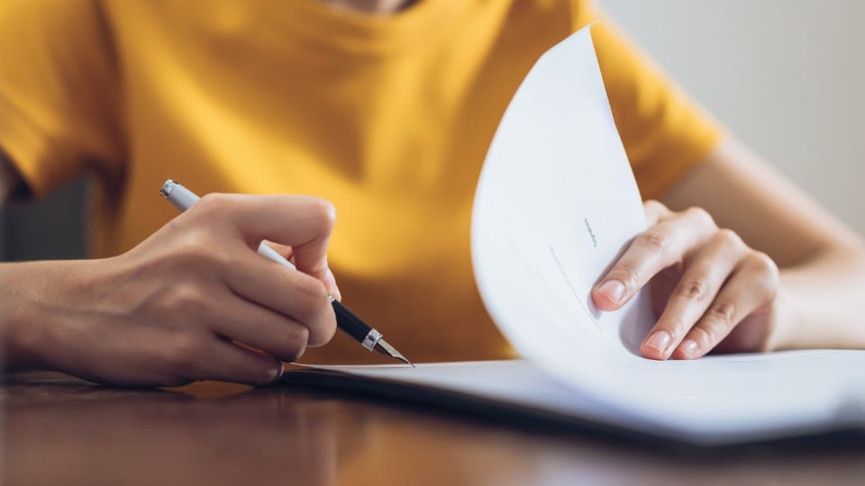 Woman filling out forms